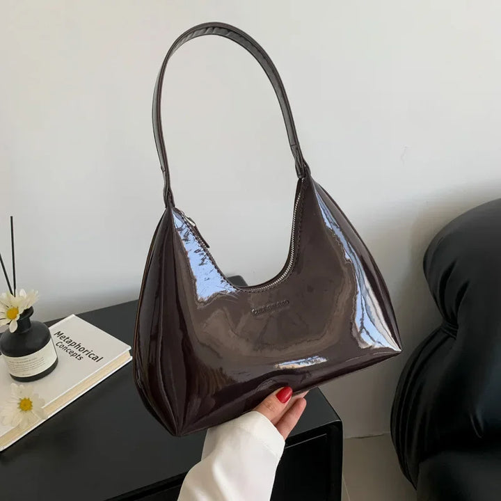 Elegant burgundy shoulder bag with a patent finish