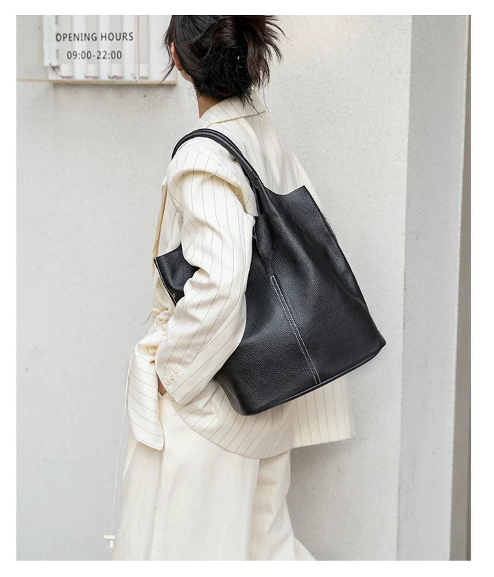 Light blue bucket bag with a luxurious leather look