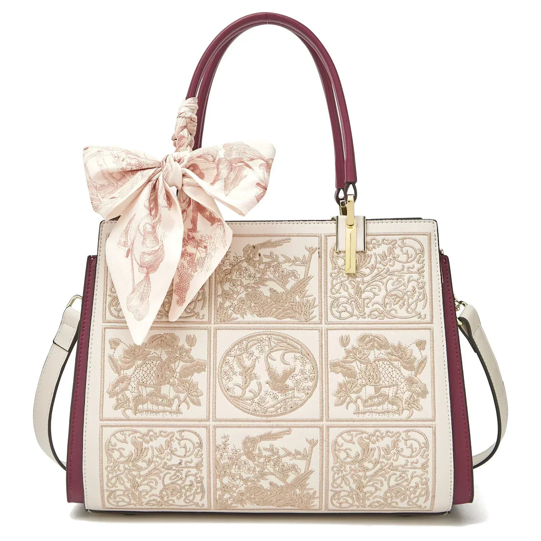 Sylvia™ – Unique crossbody bag with embroidery and bow