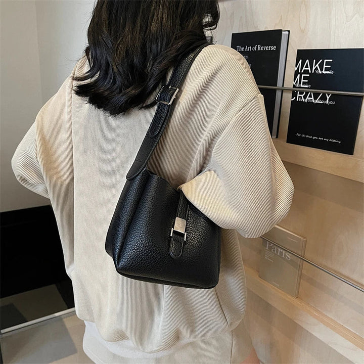 Iris™ – Modern bucket bag with a leather look