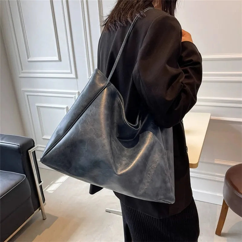 Elegant brown leather-look tote bag